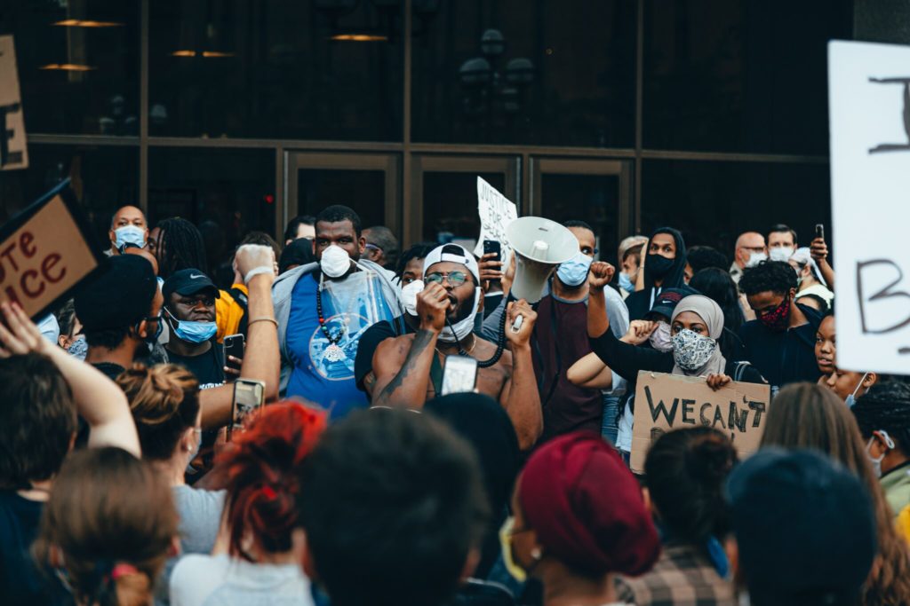 a group of black protestors. white racism